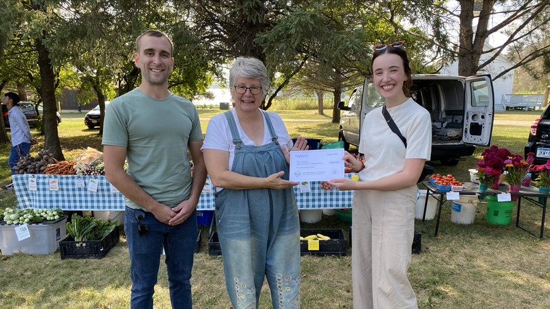 Neighborly Gifts donates $500 to The Village Agricultural Cooperative through Eat Local August campaign